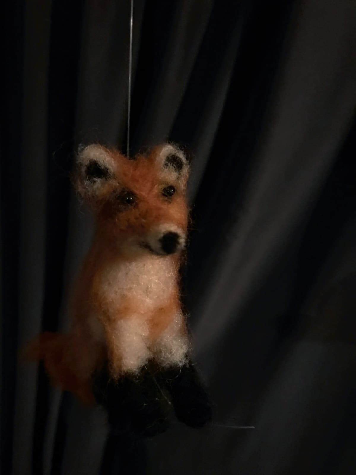 Gevilte figuur in handen